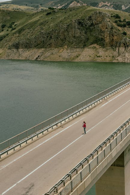 Person on a bridge representing the financial journey